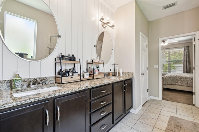 3530 Brook Crossing Dr, Brandon, FL 33511 - ensuite bathroom featuring double vanity, tile patterned flooring, a ceiling fan, and baseboards