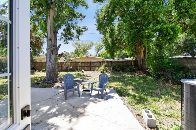 5624 62nd St N, Saint Petersburg, FL 33709 - fenced backyard featuring a patio area and central air condition unit