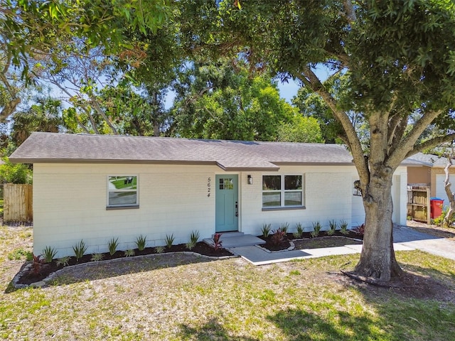 5624 62nd St N, Saint Petersburg, FL 33709 - single story home with brick siding and a shingled roof