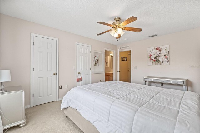 10311 Frog Pond Dr, Riverview, FL 33569 - carpeted bedroom with a ceiling fan, baseboards, and a textured ceiling