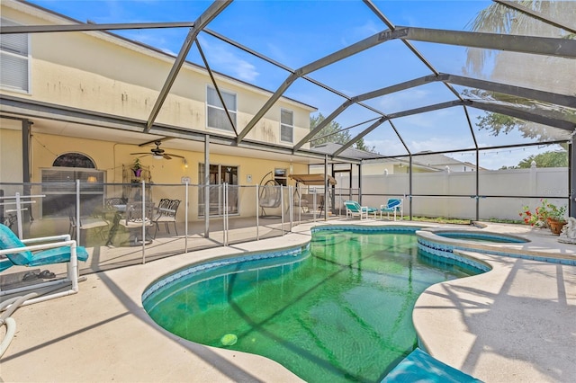 10311 Frog Pond Dr, Riverview, FL 33569 - view of pool with a patio area, glass enclosure, a ceiling fan, and a pool with connected hot tub