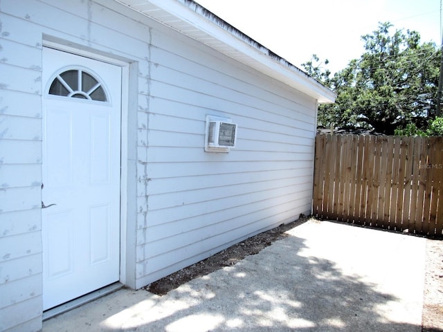 8996 Southern Comfort Dr, Largo, FL 33773 - doorway to property featuring a patio and fence