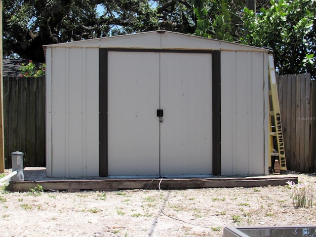 8996 Southern Comfort Dr, Largo, FL 33773 - view of shed featuring fence
