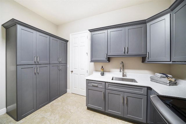 8016 Rock Spring Ct, Land O Lakes, FL 34638 - laundry area with cabinet space and baseboards