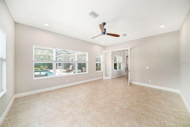 8016 Rock Spring Ct, Land O Lakes, FL 34638 - empty room with ceiling fan and recessed lighting