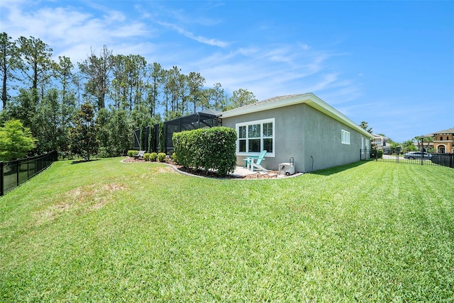 8016 Rock Spring Ct, Land O Lakes, FL 34638 - fenced backyard with a lanai