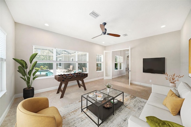8016 Rock Spring Ct, Land O Lakes, FL 34638 - living room with a ceiling fan and recessed lighting