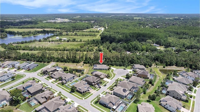 8016 Rock Spring Ct, Land O Lakes, FL 34638 - aerial overview of property's location with nearby suburban area