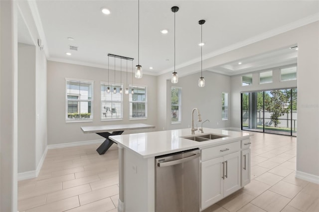 4325 Barletta Ct, Wesley Chapel, FL 33543 - kitchen featuring stainless steel dishwasher, a sink, light countertops, white cabinets, and open floor plan