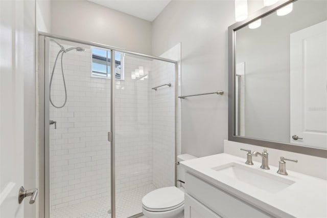 4325 Barletta Ct, Wesley Chapel, FL 33543 - bathroom with vanity, toilet, and a shower stall
