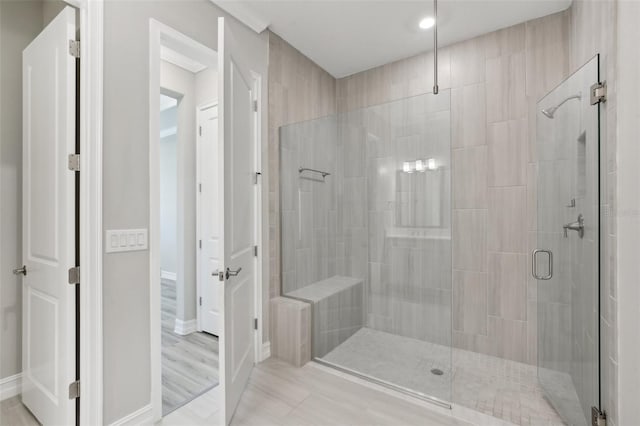 4325 Barletta Ct, Wesley Chapel, FL 33543 - bathroom with a stall shower and baseboards