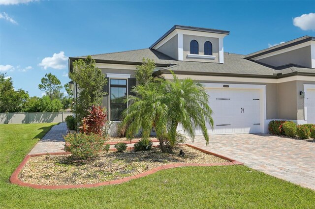 4325 Barletta Ct, Wesley Chapel, FL 33543 - view of front of house featuring stucco siding and driveway