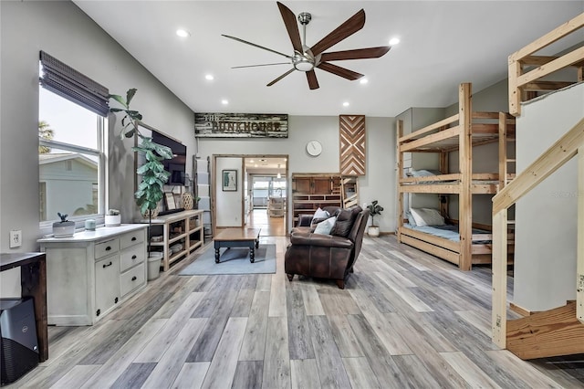 550 George St S, Tarpon Springs, FL 34688 - living area with a ceiling fan, light wood-type flooring, and recessed lighting