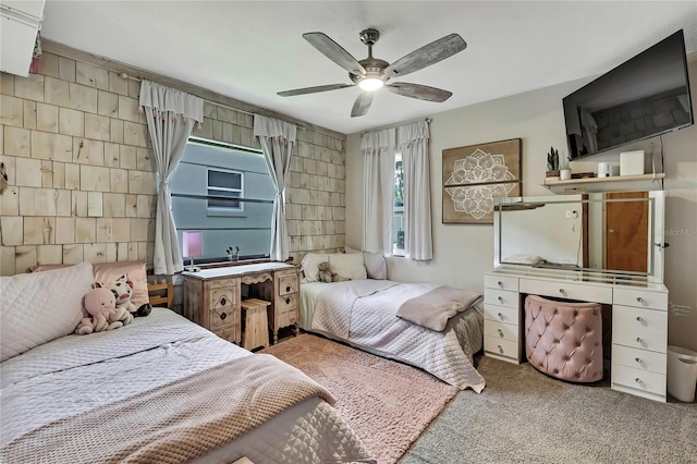 550 George St S, Tarpon Springs, FL 34688 - bedroom with carpet floors and ceiling fan