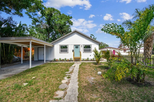 1750 Dayton St S, Saint Petersburg, FL 33712 - bungalow featuring driveway, a carport, and entry steps