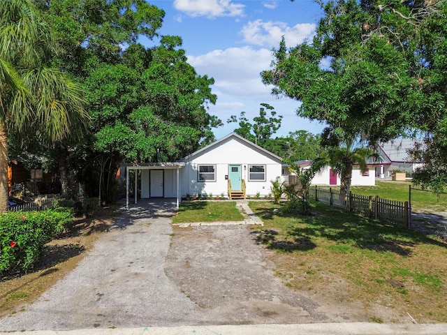 1750 Dayton St S, Saint Petersburg, FL 33712 - view of front of property with a carport and driveway