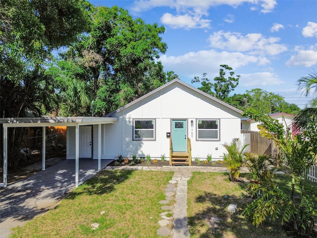 1750 Dayton St S, Saint Petersburg, FL 33712 - view of front of home with an attached carport, entry steps, and driveway