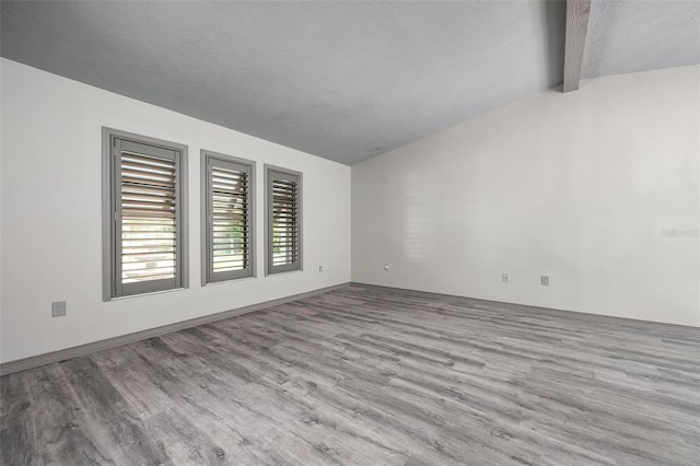 2320 James Ln, Sarasota, FL 34231 - empty room featuring wood finished floors