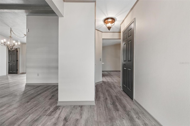2320 James Ln, Sarasota, FL 34231 - spare room featuring a chandelier and wood finished floors
