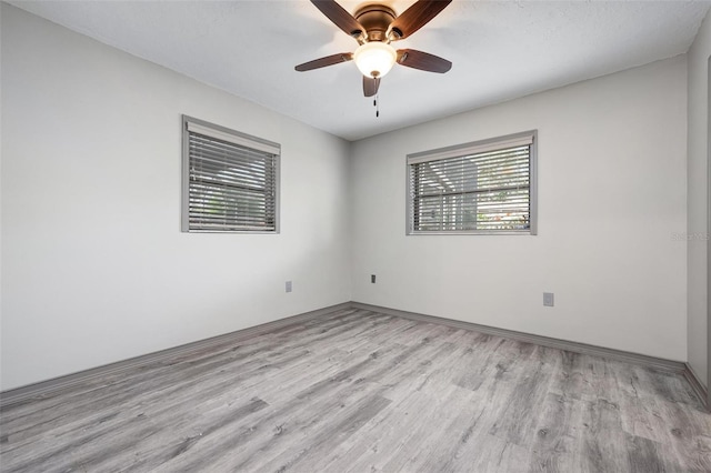 2320 James Ln, Sarasota, FL 34231 - spare room featuring wood finished floors and ceiling fan