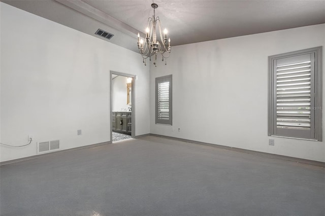 2320 James Ln, Sarasota, FL 34231 - unfurnished room with a chandelier and baseboards