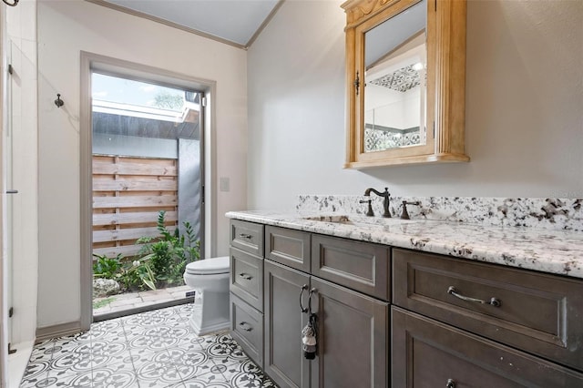 2320 James Ln, Sarasota, FL 34231 - full bathroom with vanity, a skylight, and crown molding