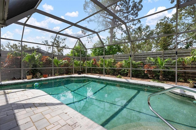 2320 James Ln, Sarasota, FL 34231 - view of pool featuring a fenced backyard, a patio, and a lanai