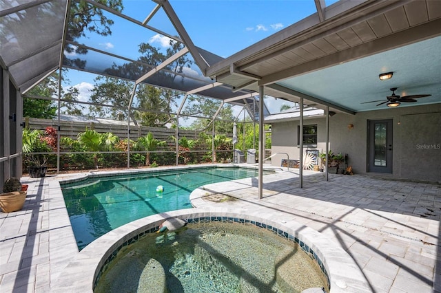 2320 James Ln, Sarasota, FL 34231 - view of swimming pool featuring a patio area, a pool with connected hot tub, ceiling fan, and a lanai
