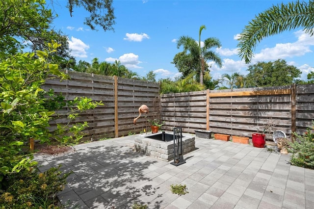 2320 James Ln, Sarasota, FL 34231 - fenced backyard featuring a patio area