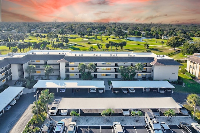 12300 Vonn Rd Unit 7107, Largo, FL 33774 - aerial view at dusk of a water view and view of golf course