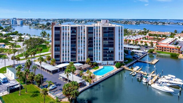 10355 Paradise Blvd Unit 502, Treasure Island, FL 33706 - aerial view of a large body of water, apartment complex, and a pool