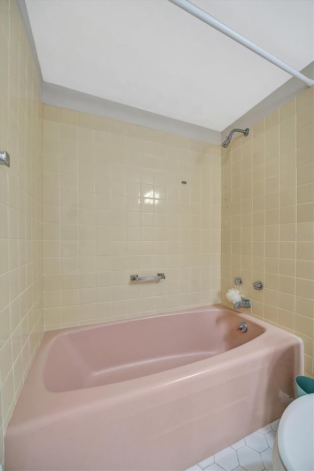 10355 Paradise Blvd Unit 502, Treasure Island, FL 33706 - bathroom with tub / shower combination and toilet