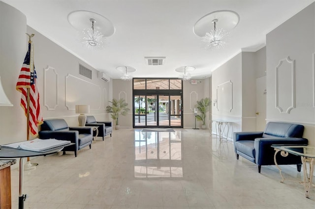 10355 Paradise Blvd Unit 502, Treasure Island, FL 33706 - community lobby featuring crown molding