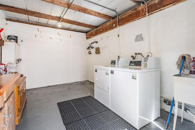 3839 Trophy Blvd Unit 3839, New Port Richey, FL 34655 - shared laundry featuring washing machine and clothes dryer and wood ceiling