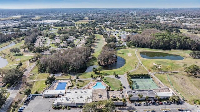3839 Trophy Blvd Unit 3839, New Port Richey, FL 34655 - aerial view of property and surrounding area featuring a nearby body of water, a golf course, and a pool