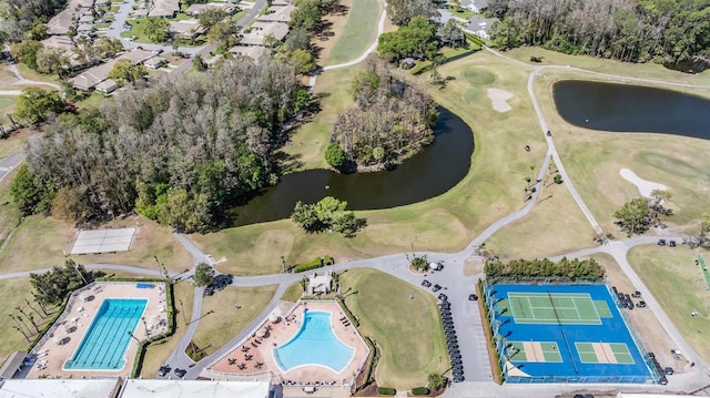 3839 Trophy Blvd Unit 3839, New Port Richey, FL 34655 - aerial view of property and surrounding area with a pool area and a nearby body of water