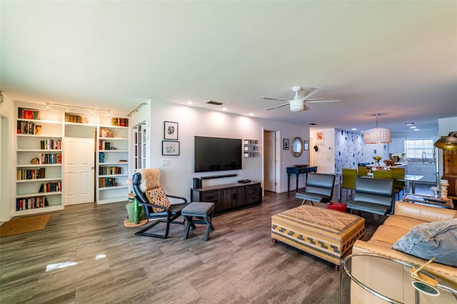 3850 13th Ave N Unit 113, Saint Petersburg, FL 33713 - living room featuring ceiling fan and wood finished floors