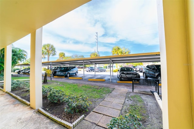 3850 13th Ave N Unit 113, Saint Petersburg, FL 33713 - view of covered parking lot