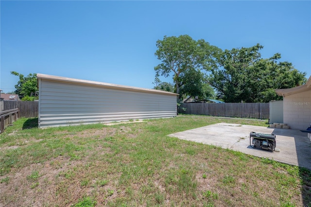 2614 E Liberty St, Tampa, FL 33612 - fenced backyard featuring a patio area