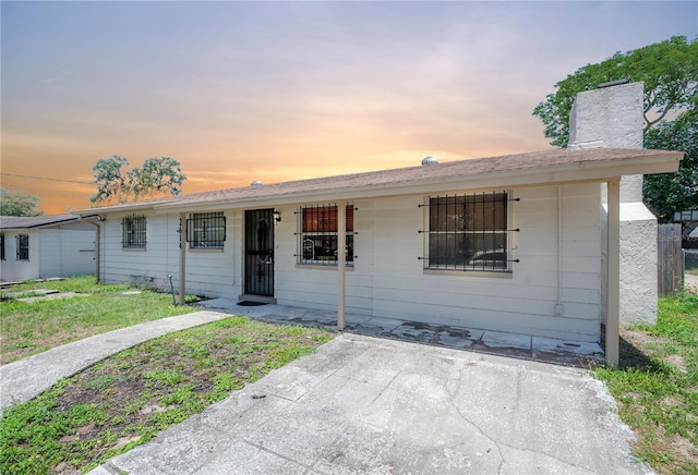 2614 E Liberty St, Tampa, FL 33612 - view of front of home featuring a chimney