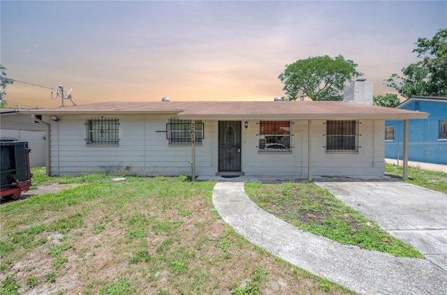 2614 E Liberty St, Tampa, FL 33612 - ranch-style house featuring a chimney