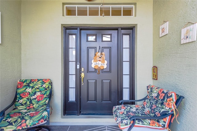 11148 Hollander Ave, Hudson, FL 34667 - property entrance featuring stucco siding