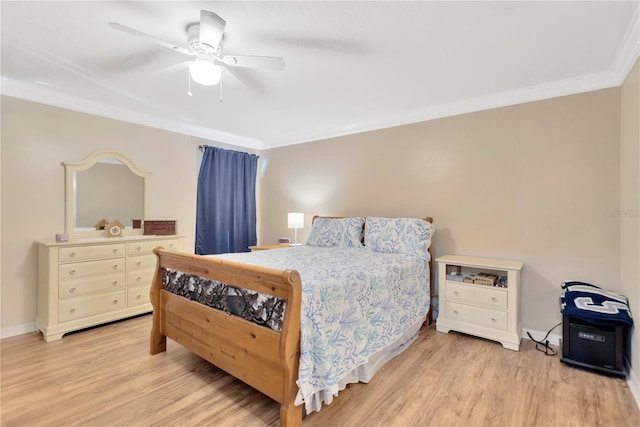 11148 Hollander Ave, Hudson, FL 34667 - bedroom featuring ornamental molding, light wood-style floors, ceiling fan, and baseboards