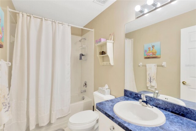 11148 Hollander Ave, Hudson, FL 34667 - full bathroom with shower / tub combo, toilet, and vanity