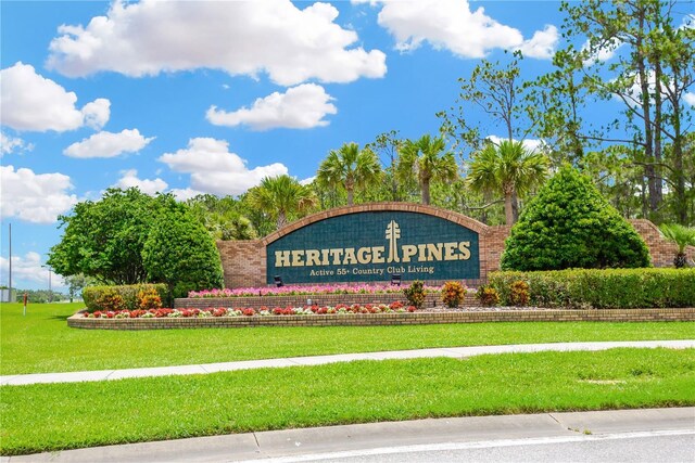 11148 Hollander Ave, Hudson, FL 34667 - community / neighborhood sign featuring a lawn