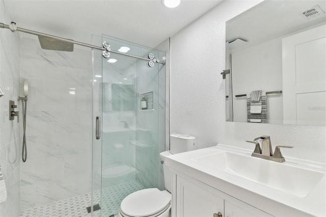 9812 Indian Key Trl Unit 84, Seminole, FL 33776 - bathroom with toilet, a shower stall, and vanity