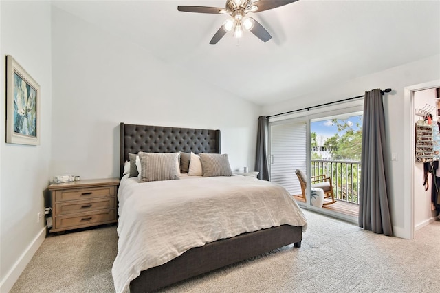 9812 Indian Key Trl Unit 84, Seminole, FL 33776 - bedroom featuring access to outside, carpet flooring, baseboards, vaulted ceiling, and a ceiling fan