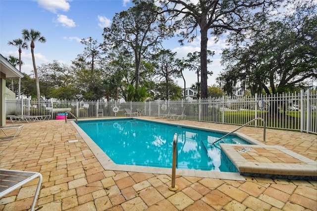 9812 Indian Key Trl Unit 84, Seminole, FL 33776 - community pool featuring a patio area