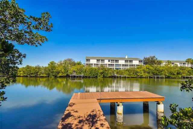9812 Indian Key Trl Unit 84, Seminole, FL 33776 - dock area featuring a water view