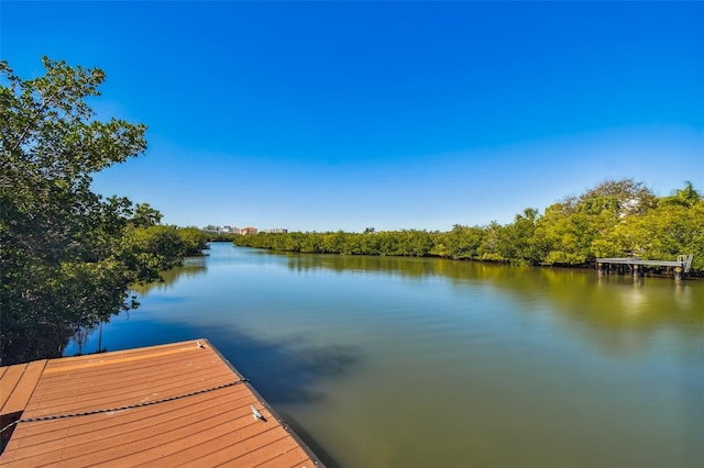 9812 Indian Key Trl Unit 84, Seminole, FL 33776 - dock area featuring a water view